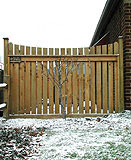 white cedar wood spaced sabre scallop fence by elyria fence